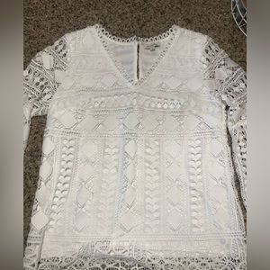 Boutique white lace lined top